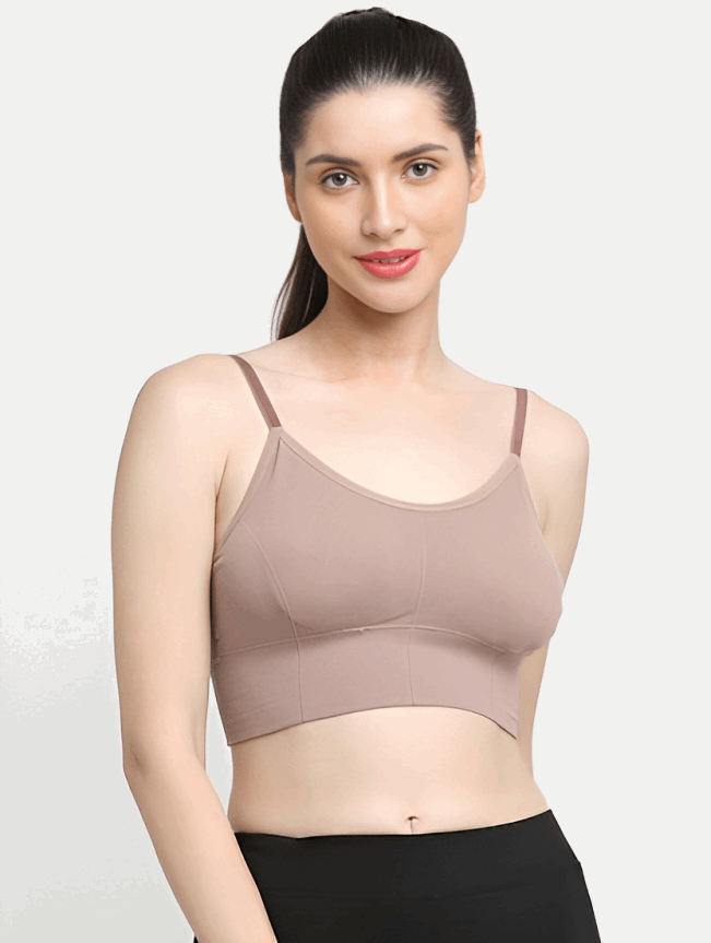 Rust Padded & Non Wired Dry Fit Solid Workout BraForget discomfort and restriction - the Rust Non-Padded &amp; Non-Wired Dry Fit Solid Workout Bra sets you free during exercise. This innovative sports bra features:Wired Dry Fit Solid Workout Bra